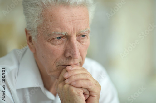 Wallpaper Mural Close up portrait of thoughtful senior man Torontodigital.ca