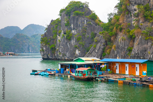 Halong Bay, Vietnam. Unesco World Heritage Site. Traditional tourist boats.