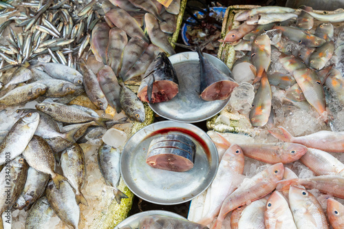 Sellers on the local market in Vietnam. Traditional food market in Hue, Vientam. photo