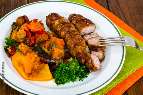 Grilled sausages with baked vegetables