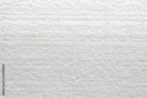 White Styrofoam Texture. White styrofoam balls background. Close shot. Safe packaging for fragile items. Detailed background of white styrofoam material