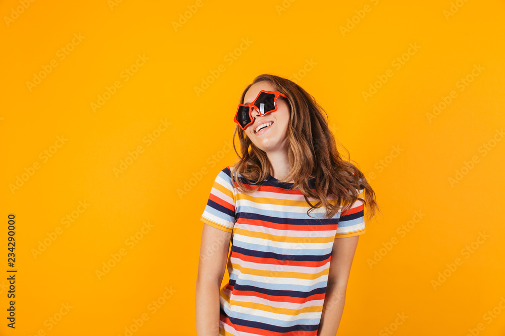 Fototapeta premium Portrait of a smiling cheerful young girl