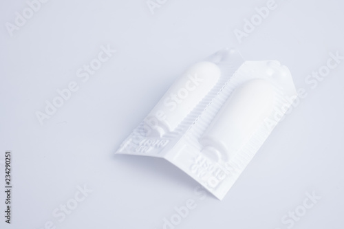 Suppositories in white pack, medicine.