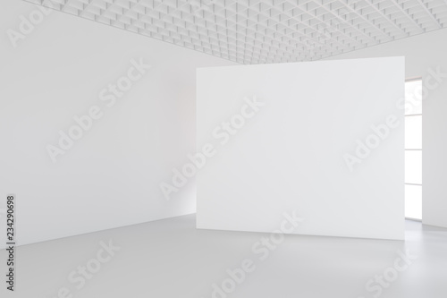 White billboard standing near a window in a white room. 3D rendering. © mirexon