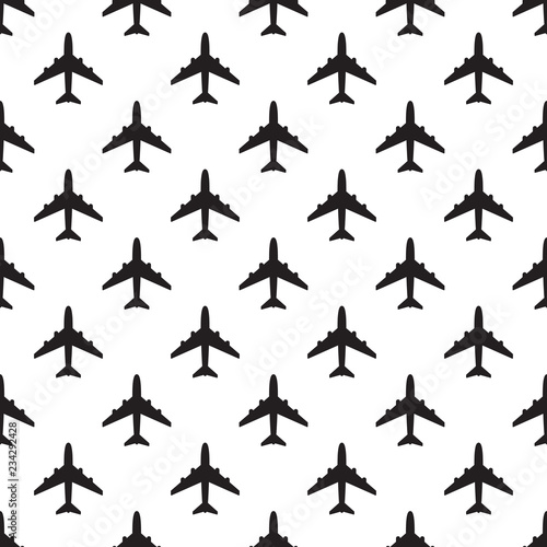Vector seamless pattern of black airplane silhouettes.