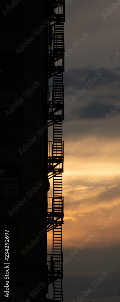 Obraz premium Fire Escapes At Sunset