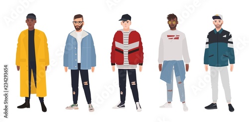 Collection of young men dressed in fashionable clothes isolated on white background. Set of guys wearing trendy apparel. Bundle of street style outfits. Flat cartoon colored vector illustration.