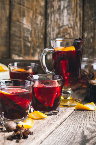 Christmas hot drinks with citrus fruits and spices, mulled wine