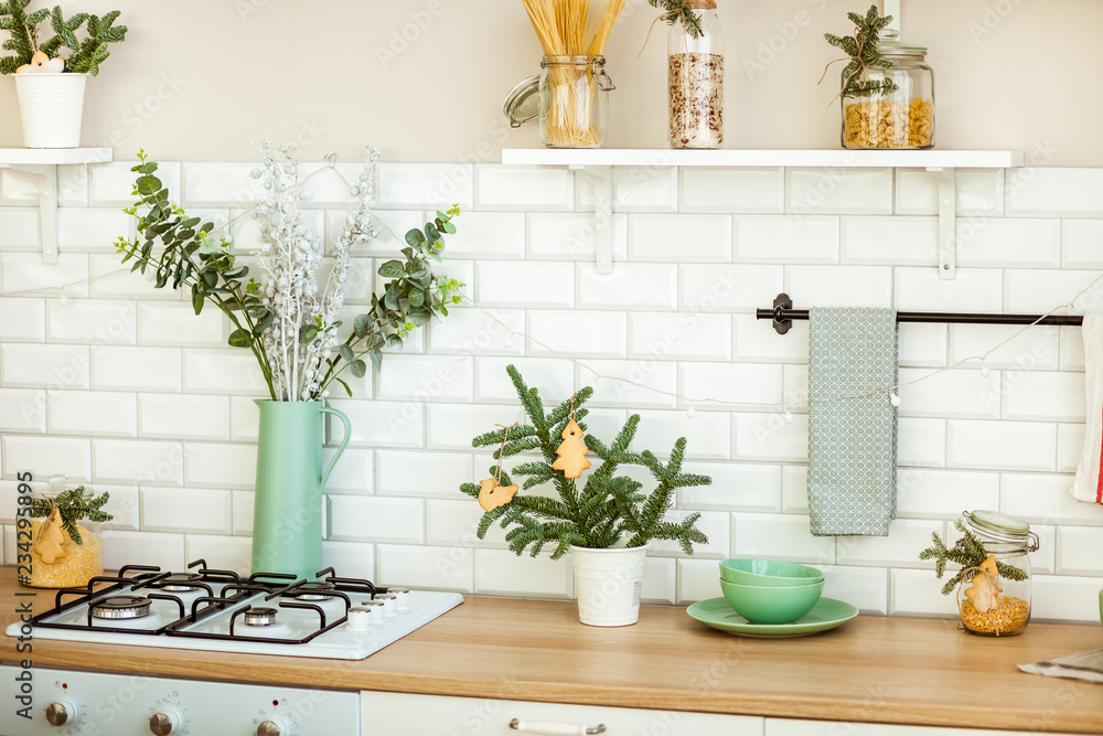 Fototapeta premium Bright kitchen with Christmas decorations
