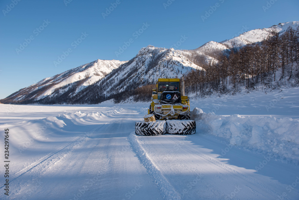 A hinder is a road, the operation of which is possible only in winter conditions, with sub-zero temperatures. Republic of Sakha / Yakutia /, Russia. A hinder is a road, the operation of which is possible only in winter conditions, with sub-zero temperatures. Republic of Sakha / Yakutia /, Russia.
