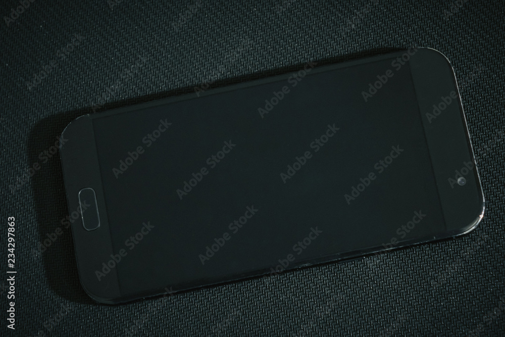 black smartphone on black background black smartphone on black background