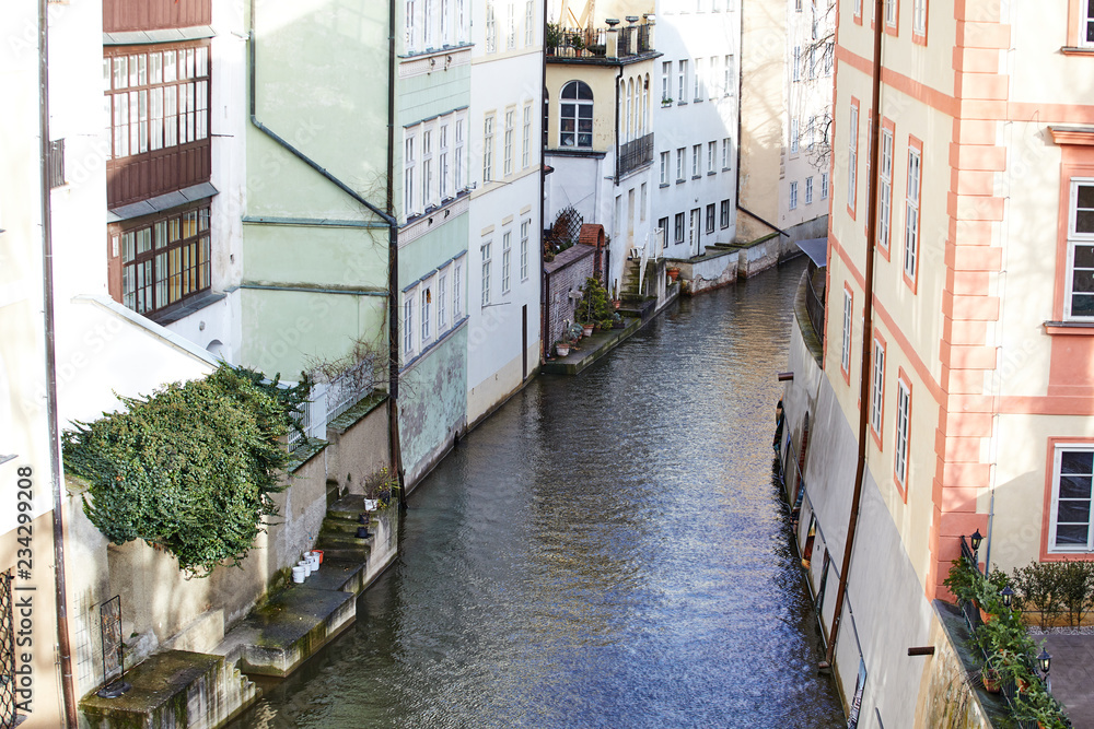 View of old Prague with canals and houses. Vacation travel destination