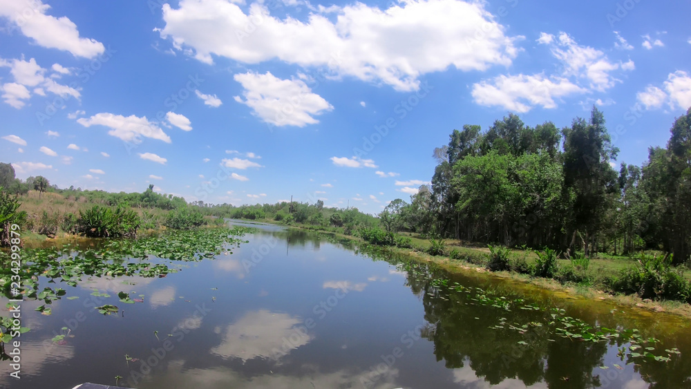 Florida Seminolen, Airboat ride at Everglades National Park in USA. Popular place for tourists, wild nature and animals.