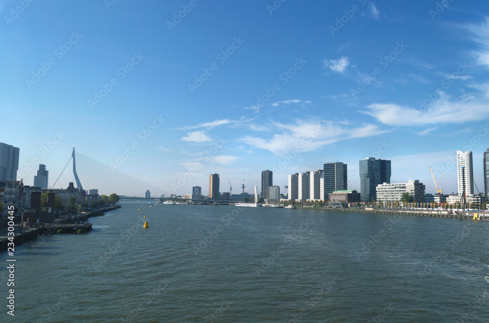 view on river in Rotterdam with modern cityscape