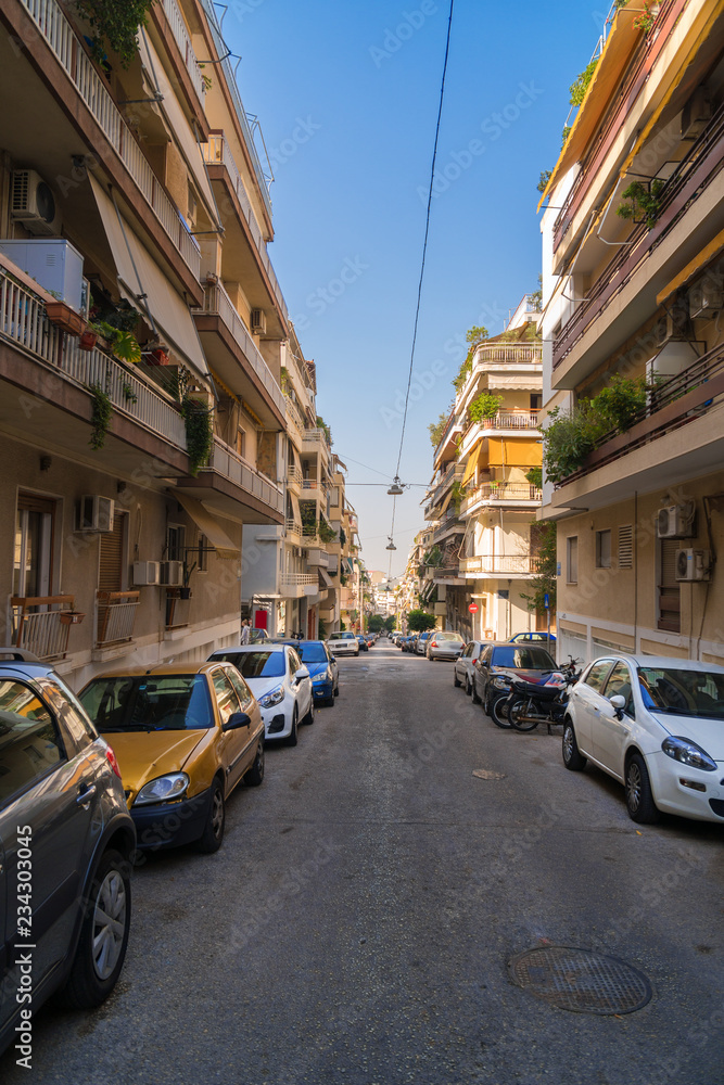 Typical street with cars in Athens in Greece.