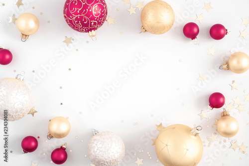 Christmas elegant composition. Christmas red and gold decorations on white background. Christmas, New Year, winter concept. Flat lay, top view, copy space 