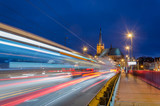 CITYSCAPE - Urban traffic at night on the bridge in Szczecin 