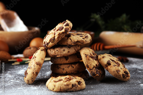 Chocolate cookies on rustic table. Chocolate chip cookies shot