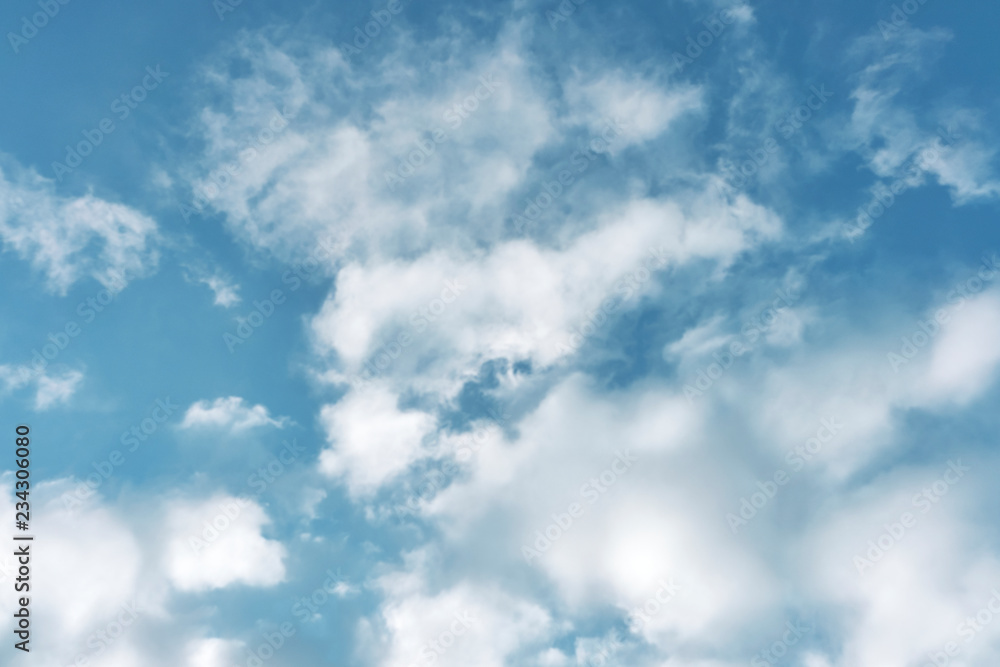 beautiful white clouds on a bright blue sky on a warm summer day