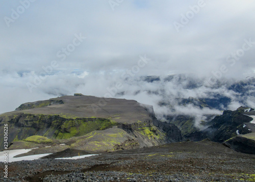 Epic landscape around plateau of Morinsheidi with mountains and glaciers in the clouds, between the Eyjafjallajokull and Myrdalsjokull in southern Iceland