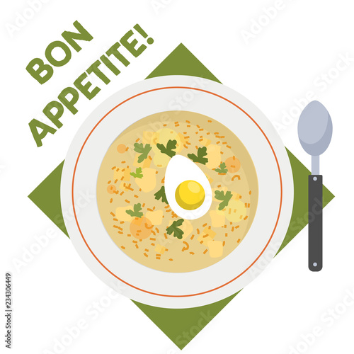 Chicken soup with egg in the plate