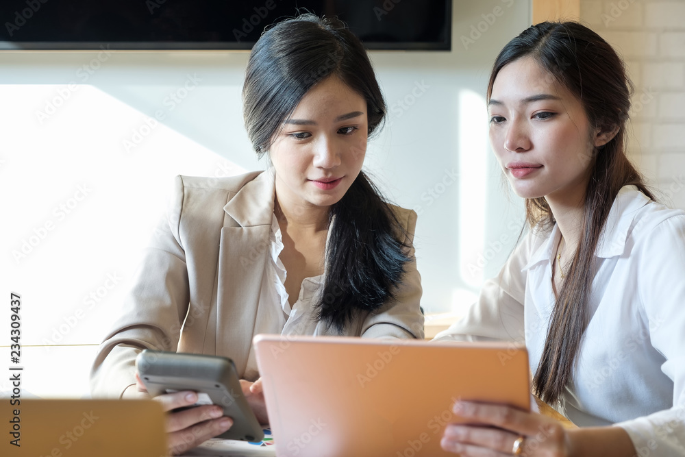 Attractive Asian Business People Analyzing Statistics Business Documents, Business Meeting Dicussion Concept Attractive Asian Business People Analyzing Statistics Business Documents, Business Meeting Dicussion Concept