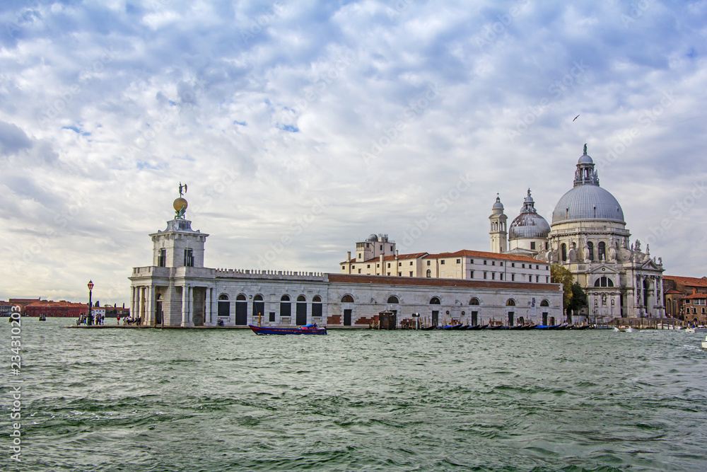 Views of beautiful buildings, gondolas, bridges and canals in Venice