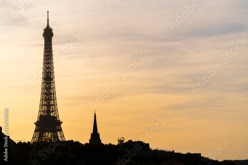 Silhouette Sunset view of Eiffel tower in Paris, France. Summer Paris. Architecture and landmarks of Paris. Postcard of Paris © Poh Smith