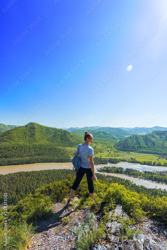 Woman in Altai mountain, beauty summer landcape