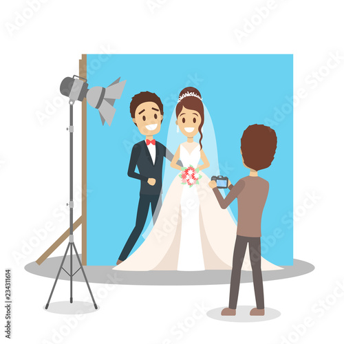 Wedding couple in the photostudio making photoshoot