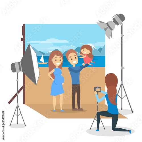 Happy family making photoshoot on the sea background