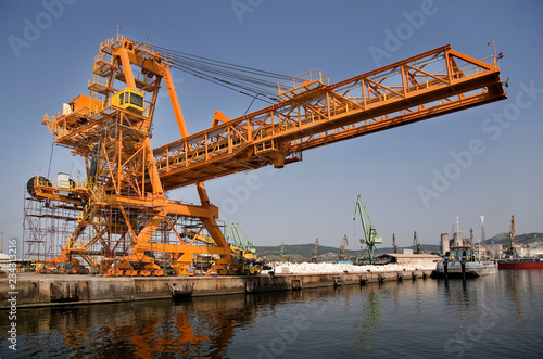 A shot of a yellow ship crane