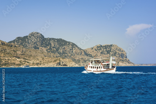 Boat trip in Mediteranean sea near coast of island of Rhodes (Rhodes, Greece) © lubos K
