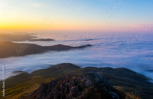 Beautiful sunset in the Crimean mountains, Crimea. Majestic sunset in the mountains landscape with sunny beams.
