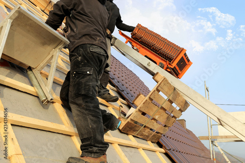 Tiling a roof photo