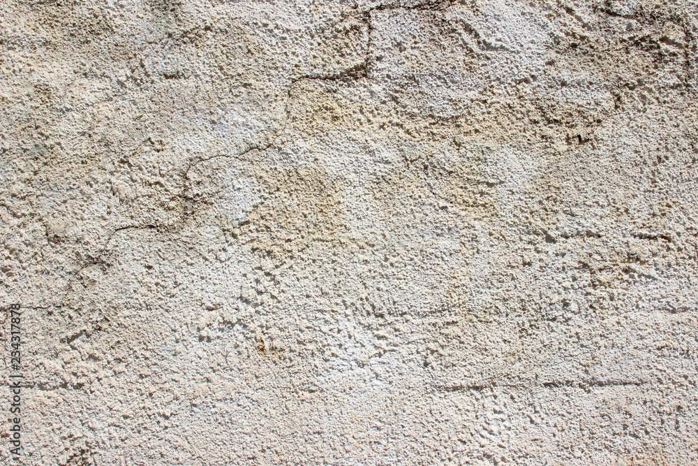 Old white grey gray plaster stucco wall outer weathered stained detail close up Old white grey gray plaster stucco wall outer weathered stained detail close up