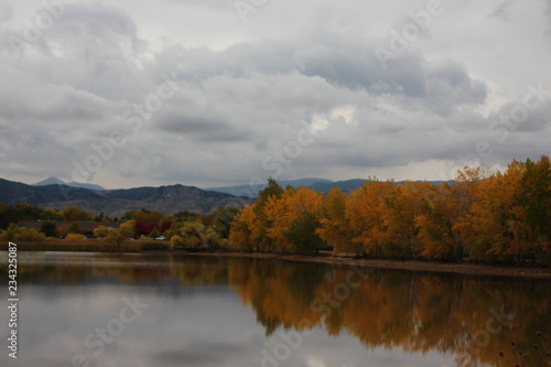 autumn landscape with lake and sky