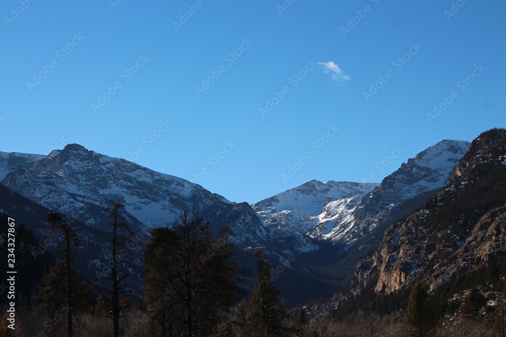 view of mountains in winter view of mountains in winter
