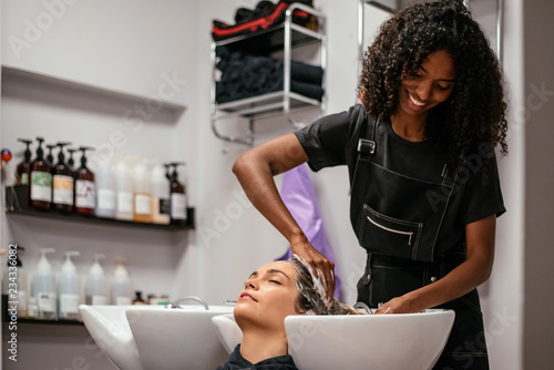 Woman having her hair washed in a salon