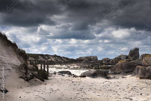 Sand dunes coastline in Manaham, Brittany, France. It was a windy day, with beautiful sunset