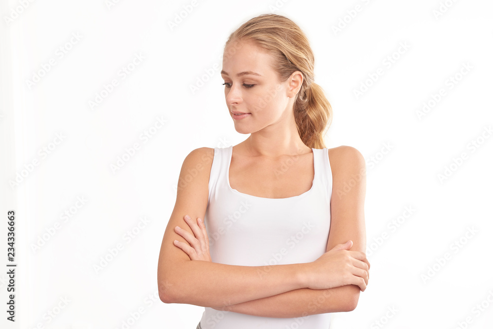 Young woman with beautiful face standing at isolated white background. Beauty shot. Young woman with beautiful face standing at isolated white background. Beauty shot.