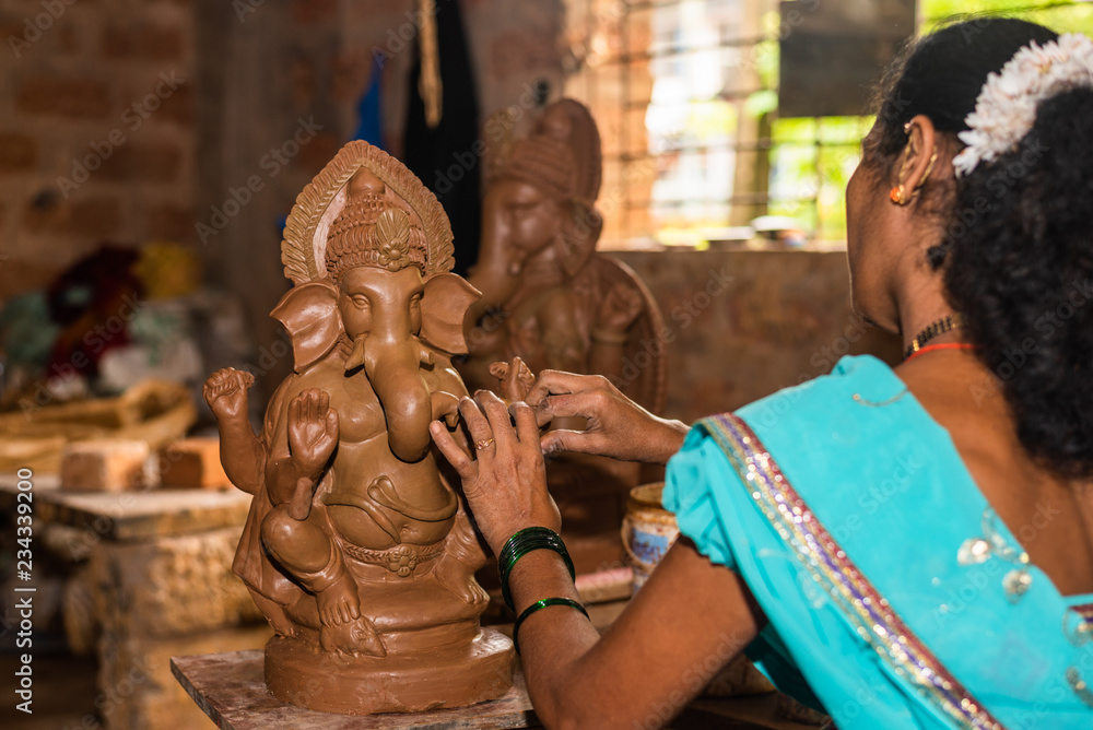 Clay model of Lord Ganesh\Ganesha being molded by local artist in the town of Bicholim, Goa