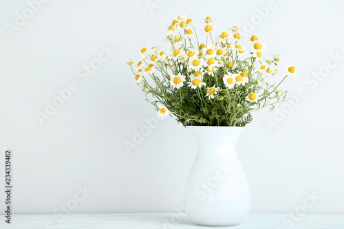 Wallpaper Mural Bouquet of chamomile flowers in vase on grey background Torontodigital.ca