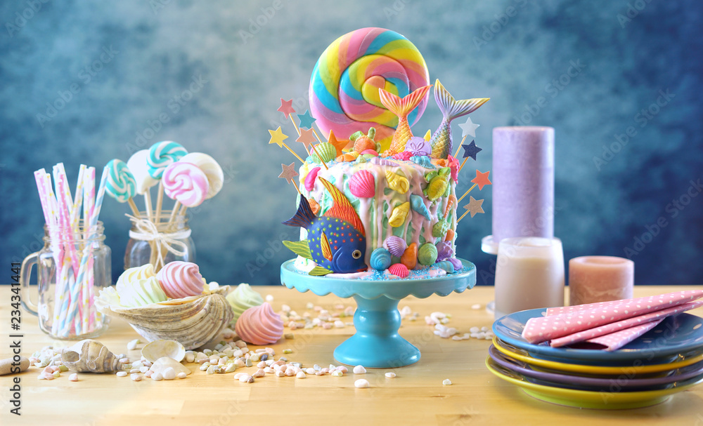 Φωτογραφία Mermaid theme candyland cake with colorful glitter tails, shells and sea creatures toppers for children's, teen's, novelty birthday and party celebrations