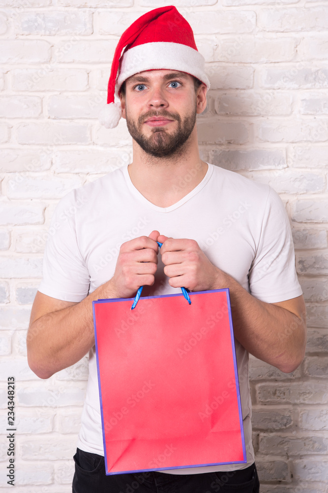 online christmas shopping. Happy new year, copy space. delivery christmas gifts. man in santa hat hold christmas present. happy santa man. The morning before Xmas. Are you ready. Dear santa online christmas shopping. Happy new year, copy space. delivery christmas gifts. man in santa hat hold christmas present. happy santa man. The morning before Xmas. Are you ready. Dear santa