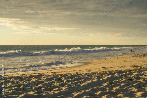 Solitaire australian beach at sunset lights