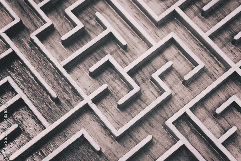 Wooden brown labyrinth maze puzzle close up Wooden brown labyrinth maze puzzle close up