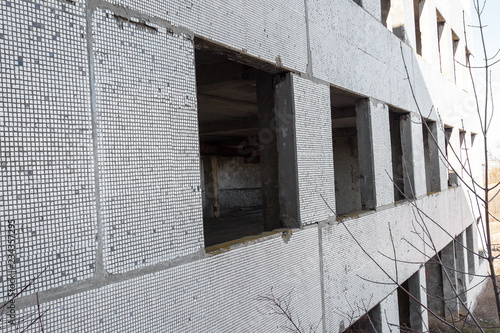 Corps of an old abandoned industrial plant. Abandoned construction of a nuclear power plant in Odessa, Teplodar. Industrial unnecessary object since the USSR photo