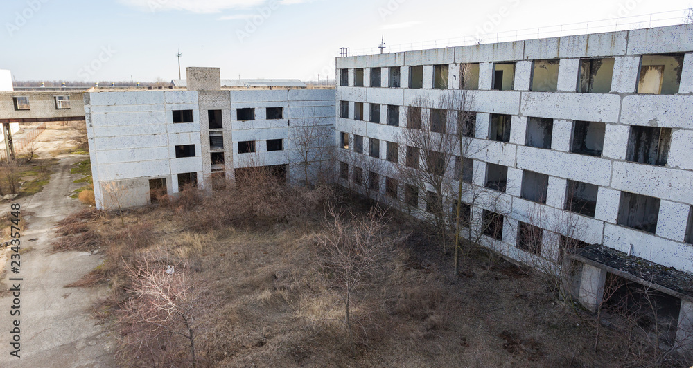 Corps of an old abandoned industrial plant. Abandoned construction of a nuclear power plant in Odessa, Teplodar. Industrial unnecessary object since the USSR Corps of an old abandoned industrial plant. Abandoned construction of a nuclear power plant in Odessa, Teplodar. Industrial unnecessary object since the USSR