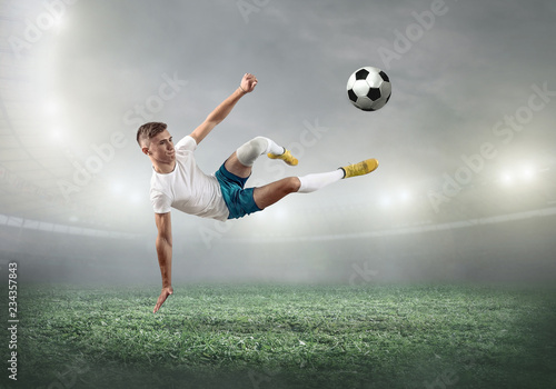 Caucasian soccer Players in dynamic action with ball 